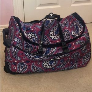 Purple Vera Bradley rolling luggage